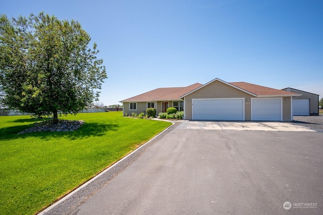 single story home featuring a front yard