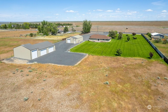 birds eye view of property featuring a rural view