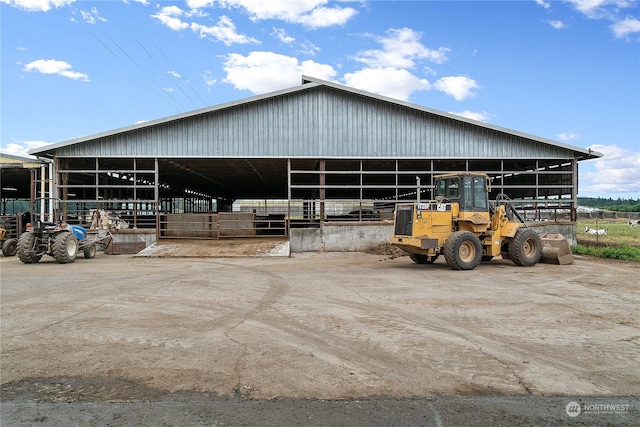 view of horse barn featuring an outdoor structure