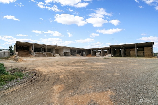 exterior space with a carport