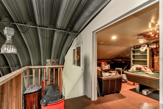 interior space with built in features, lofted ceiling, and pool table