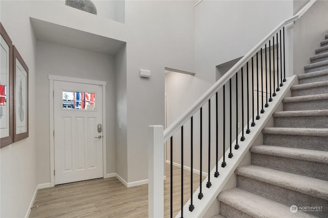 foyer with light hardwood / wood-style flooring