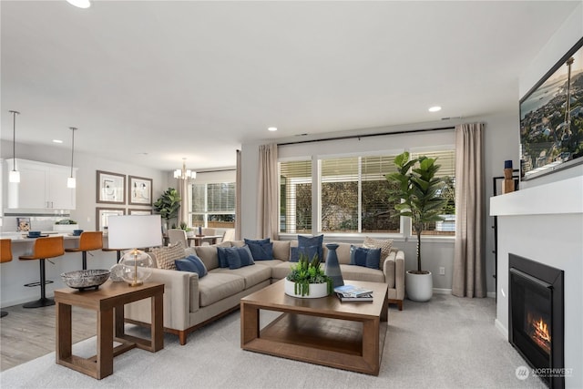 living room with an inviting chandelier