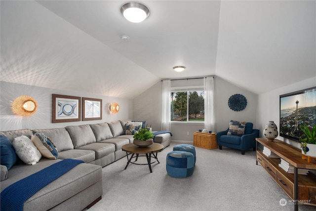 living room featuring vaulted ceiling and light colored carpet