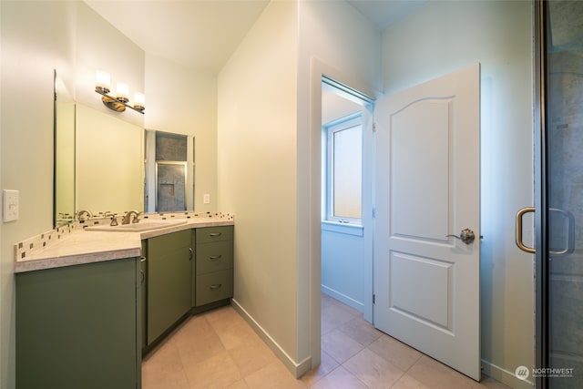 bathroom with tile floors and oversized vanity