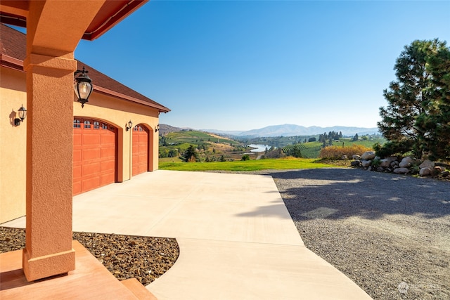 view of terrace with a mountain view