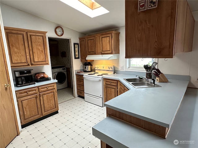 kitchen with light tile flooring, vaulted ceiling with skylight, sink, washer / clothes dryer, and electric stove