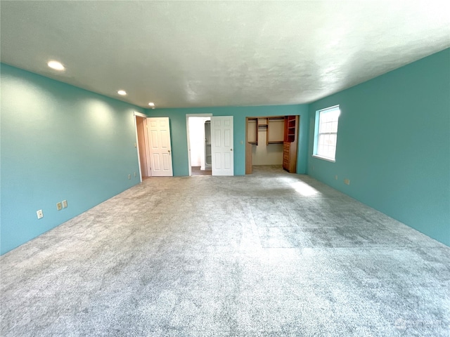653 Sunset Ave NE, Ocean Shores, WA 98569 - unfurnished room with light colored carpet