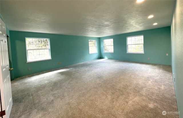 653 Sunset Ave NE, Ocean Shores, WA 98569 - spare room with carpet