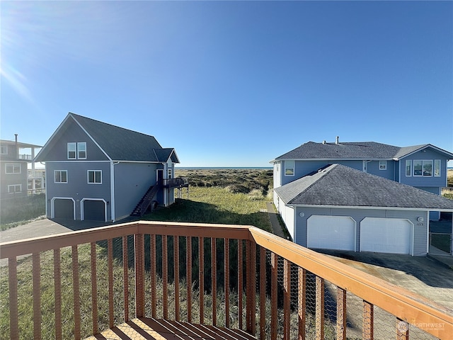 wooden deck with a garage