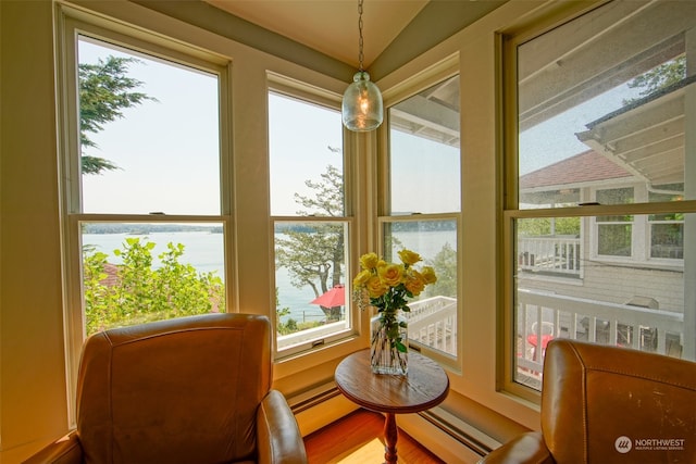 sunroom featuring baseboard heating