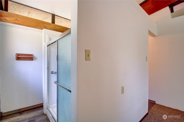 hallway featuring dark wood-type flooring