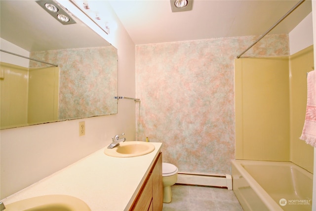 full bathroom with oversized vanity, baseboard heating, toilet, tile flooring, and shower / tub combination