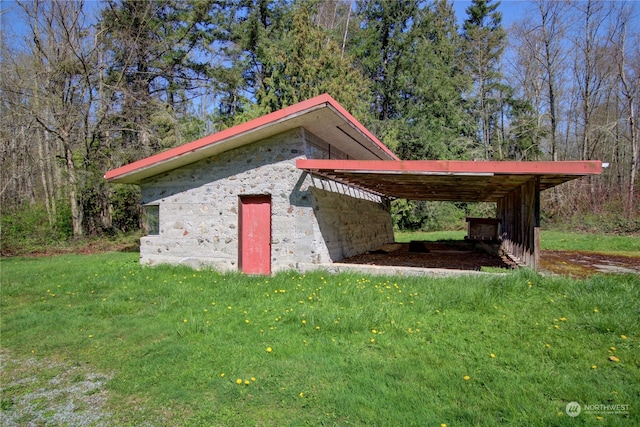 view of property exterior with a yard