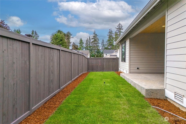 view of yard with a patio area