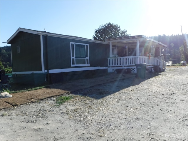 view of front of home with a pergola