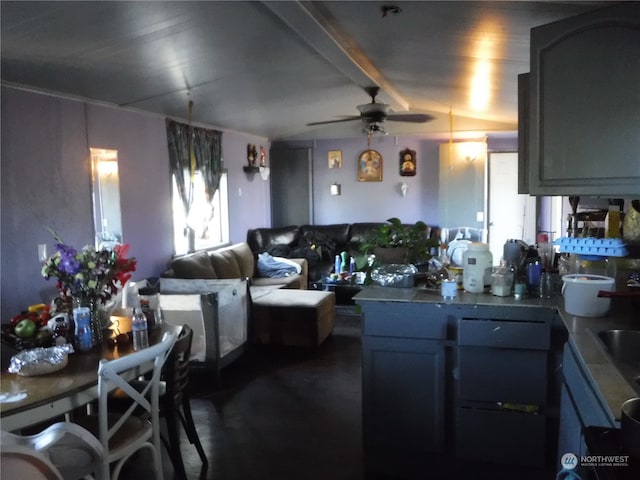 kitchen with gray cabinetry and ceiling fan