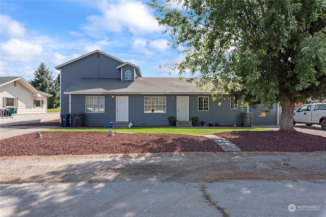 view of front of home with a front lawn