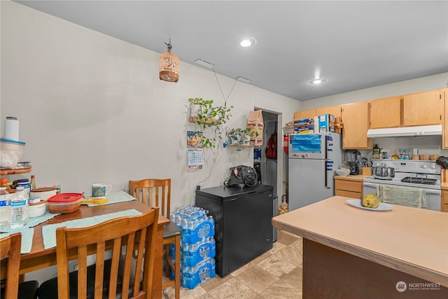 59 N Iowa Ave, East Wenatchee, WA 98802 - kitchen with white appliances and light tile flooring