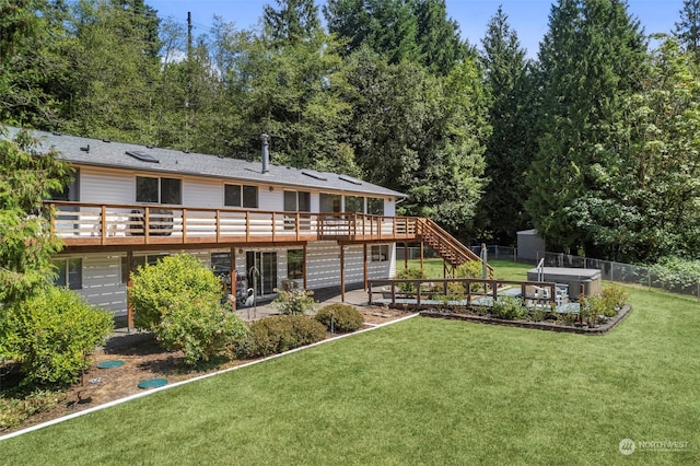 view of yard featuring a deck and a patio