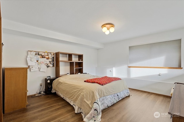 bedroom with light hardwood / wood-style floors