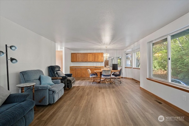 interior space with an inviting chandelier and a wealth of natural light