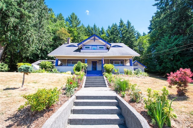 view of front of property featuring covered porch