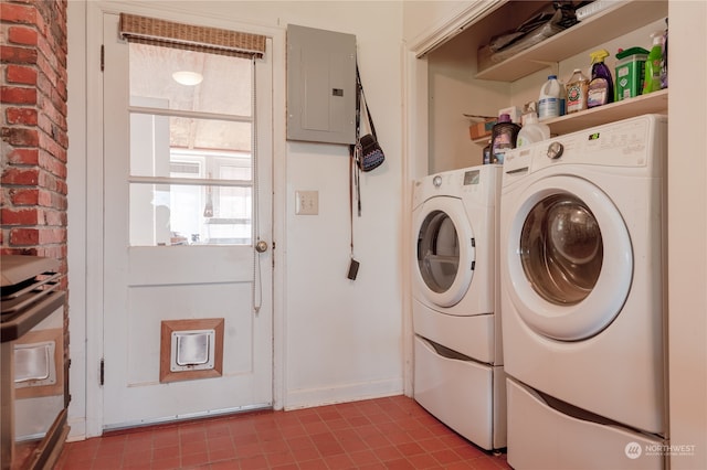 laundry room featuring independent washer and dryer and tile floors