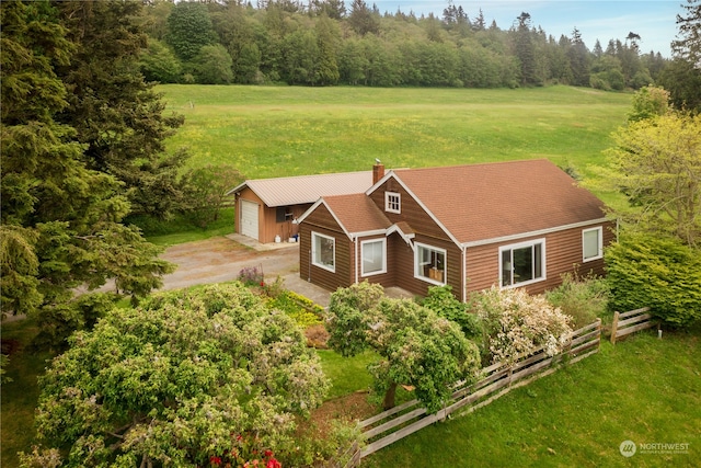 view of front of house featuring a garage and a front yard