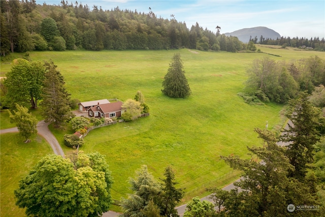 birds eye view of property with a rural view