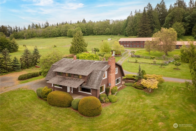 birds eye view of property featuring a rural view