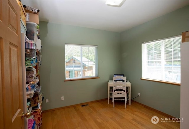 recreation room featuring light hardwood / wood-style floors