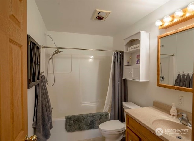 full bathroom featuring toilet, shower / tub combo with curtain, and large vanity