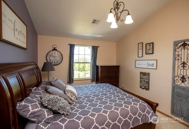 carpeted bedroom with a notable chandelier and lofted ceiling