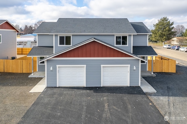 view of front of property featuring a garage