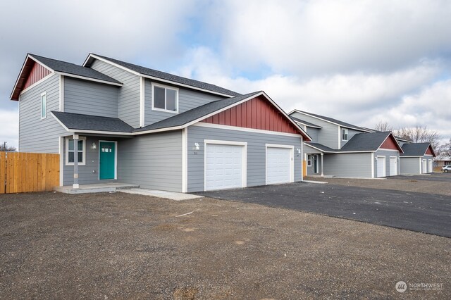 view of front of property featuring a garage