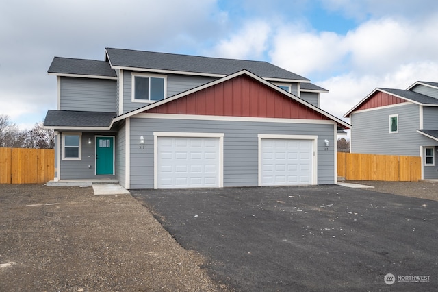 view of front of property with a garage