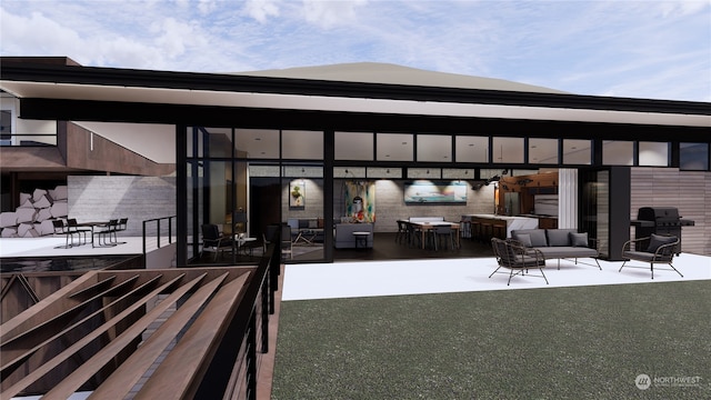 view of patio / terrace with a bar, an outdoor living space, and grilling area