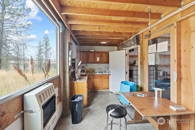 sunroom with sink and heating unit