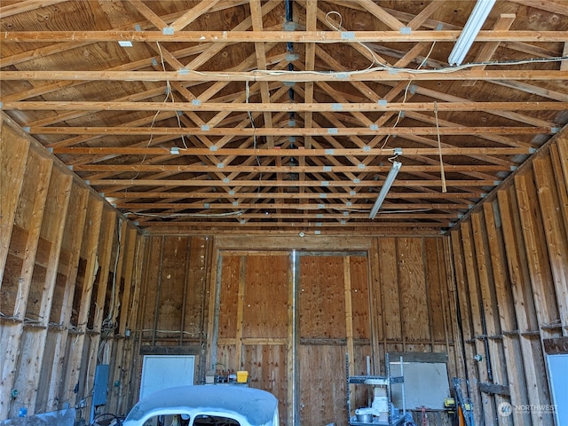 miscellaneous room featuring high vaulted ceiling