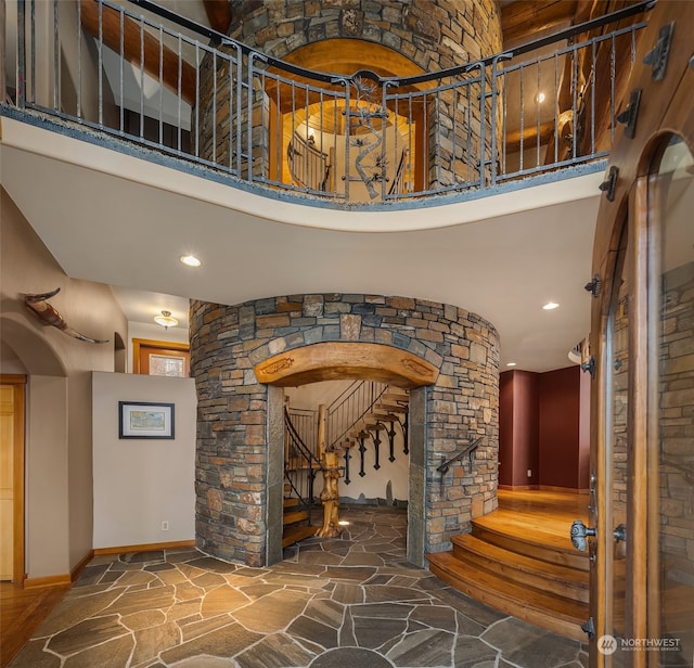 foyer featuring a high ceiling