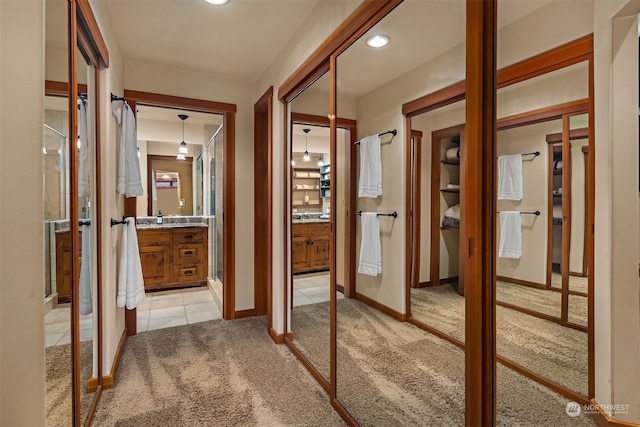 bathroom with tile floors and large vanity