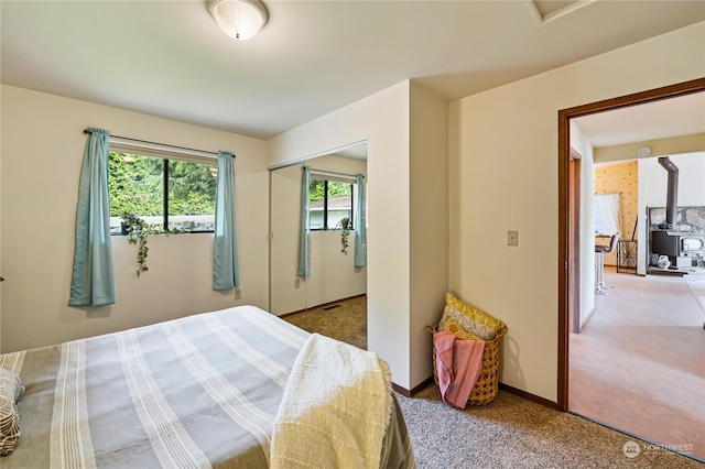 bedroom with a closet and carpet floors