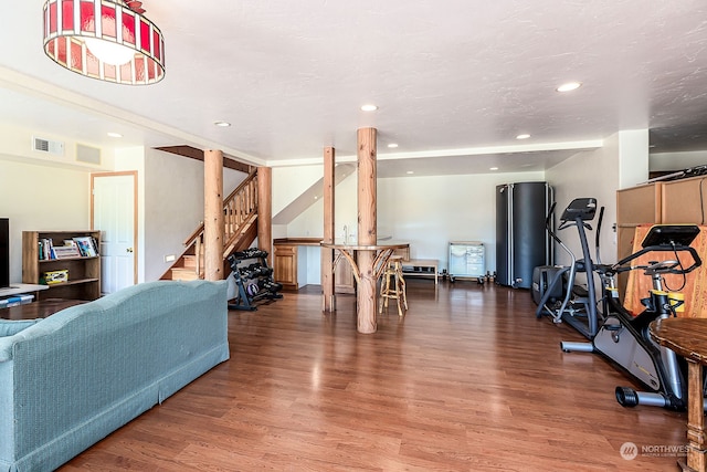 workout room featuring wood-type flooring