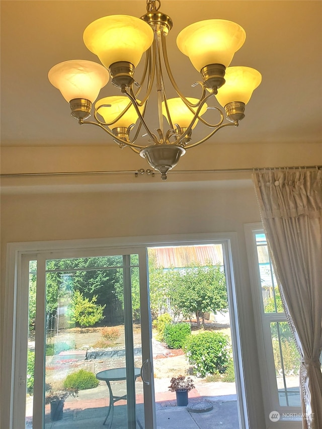 details featuring an inviting chandelier