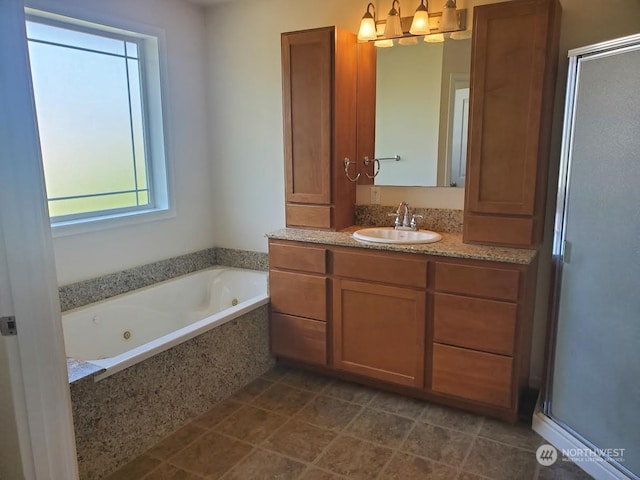 bathroom featuring tile flooring, plus walk in shower, and vanity