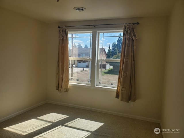 view of carpeted spare room