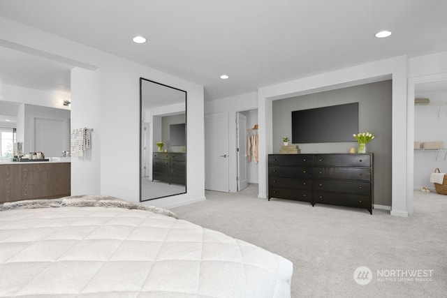 bedroom featuring light colored carpet