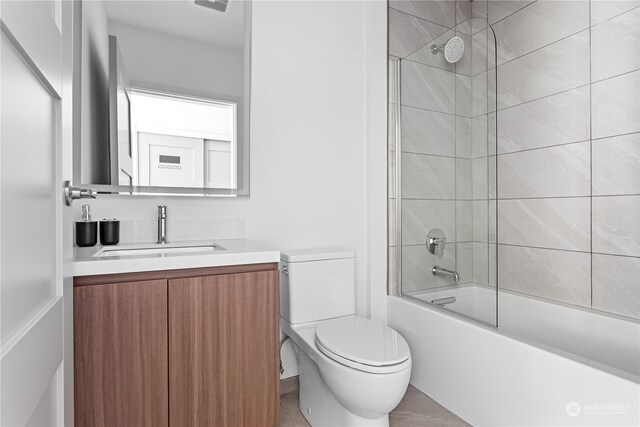 bathroom with toilet, vanity, visible vents, and bathing tub / shower combination