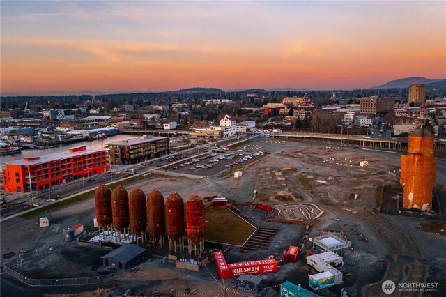 aerial view at dusk with a view of city